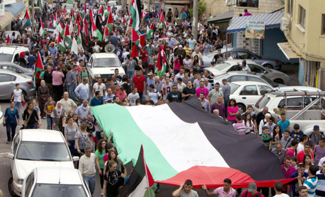 العشرات يشاركون بمسيرة نظمتها الجهاد بغزة في ذكرى يوم الأرض