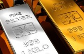 الذهب يتراجع أمام تقدم الدولار 