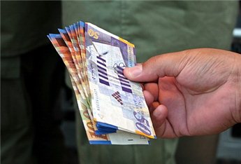 صرف العملات مقابل الشيكل