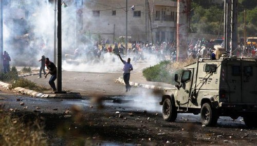 إصابات خلال مواجهات مع الاحتلال بالضفة وغزة
