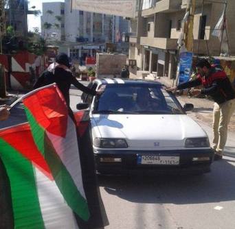 حملة لرفع العلم الفلسطيني بمخيمي الرشيدية والبرج الشمالي