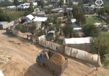 احتجاجات على قرار إزالة بيوت سكنية غرب خانيونس لصالح تمدد مشروع حمد السكني – 13 – 12 – 2015 – رمزي أبو جزر