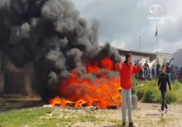 أهالي مخيم نهر البارد يخرجون في مسيرة حاشدة احتجاجا على مماطلة الأونروا  - 11 – 4 – 2015 –  امتثال هنداوي