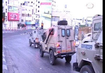 إجراءات مشددة وانتشار أمني مكثف في مناطق الضفة الغربية المحتلة عشية عيد الفصح – 3 – 4 – 2015 – أماني عثمان