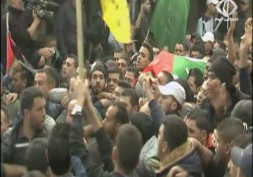 حشود غفيرة تشيع جثماني الشهيدين وإضراب تجاري مدينة رام الله - 16 - 11 - 2015 - فاتن الصالح