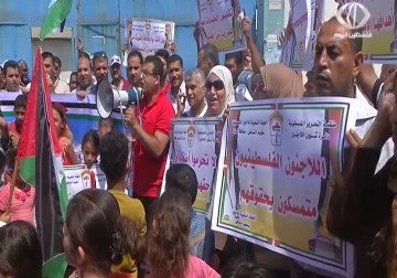 القوى الوطنية والإسلامية تنظم اعتصاما للتنديد بسياسة الأونروا تقليص خدماتها - 26 - 7 - 2015 - يوسف أبو كويك