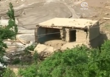عشرات القتلى تسببت بها الفيضانات شمال افغانستان - 8 - 6 - 2014 - حسين مكي