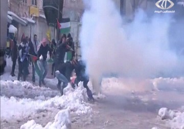 مواجهات بمسيرة إحياء الذكرى 20 لإغلاق الاحتلال شارع الشهداء في الخليل – 20 – 2 – 2015 – امتثال هنداوي