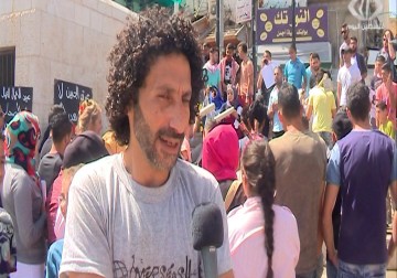 عشرات الشبان يحيون يوم العمال العالمي في مدينة طولكرم - 1 - 5 - 2016