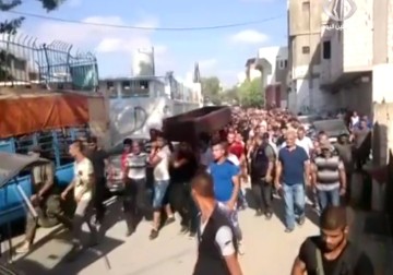 تشييع طلال البلاونة في مخيم عين الحلوة الذي اغتيل على يد مجهولين قبل يومين  - 27 - 7 - 2015 - علي سليمان