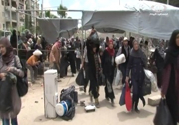 مخيم اليرموك: عامان من التشرد والتهجير والحصار – 16 – 12 – 2014 - رنا بجيرمي