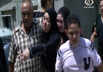 مصرع لاجئ فلسطيني وطفلته في مخيم برج الشمالي جراء صعقة كهربائية - 19 - 8 - 2015 - مريم الحاج موسى