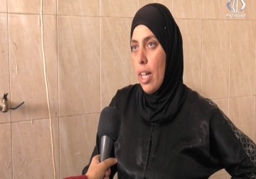 زوجة أسير ووالدة أسيرين تدير 