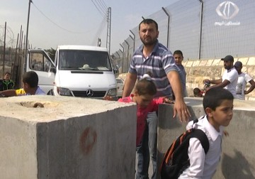 إضراب شامل في حي العيساوية في القدس المحتلة احتجاجا على قرار الاحتلال عزلها - 20 - 10 - 2015 - إسراء سلهب