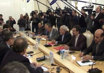 مباحثات بين الرئيس الروسي فلاديمير بوتين ووزير الخارجية الإيراني محمد جواد ظريف حول تطورات الأزمة السورية  في موسكو - 16 – 1 – 2014 – حسين مكي