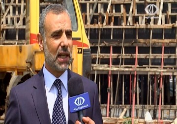 استكمال بناء مدرجات ملعب فلسطين الدولي رغم العقبات المتمثلة في شح المواد في قطاع غزة  – 12 – 5 – 2015 – محمود فارس