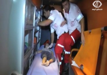 أهالي غزة يشيعون جثمان الشهيدة نور حسان وطفلتها- 12-10-2015 - رمزي البيروتي