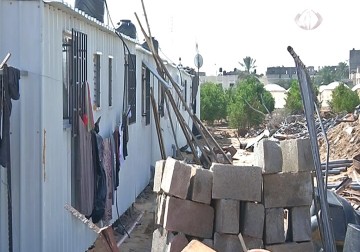 خبراء اقتصاديون: المساكن البديلة لم ولن تكون حلا بديلا لإعادة إعمار قطاع – 29 – 3 – 2015 – هادي خزعل