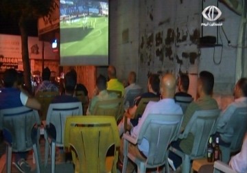 مباريات كرة القدم تنعش المقاهي الشعبية في الضفة الغربية – 18 – 5 – 2015 - رغدة عتمة