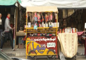 البسطات الصغيرة مصدر رزق عشرات الفلسطينيين في المركز التجاري المدمر – 16 – 1 – 2015 - علاء سلامة