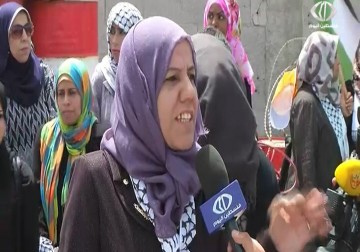 موحدين تحت العلم الفلسطيني... مسيرة جماهيرية حاشدة في غزة إحياء ليوم النكبة   - رمزي أبو جزر - 15 - 5 - 2016