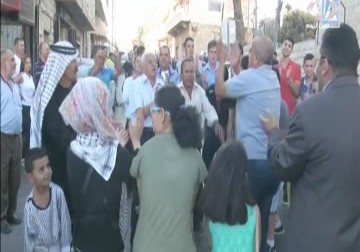 كرمل ياسين تفوز بلقبزهرة الريف خلال مهرجان زهرة الريف للتراث الشعبي الفلسطيني في بيرزيت – 21 – 09 – 2015 – نورا مشهراوي