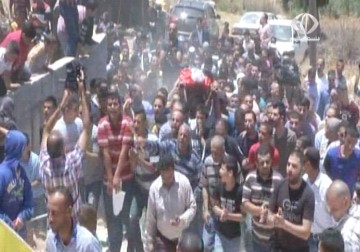 المئات يشيعون جثمان الشهيد غنيمات من بلدة  كفر مالك قضاء رام الله بعد دهسه من قبل جنود الإحتلال – 14 – 6 – 2015 - رغدة عتمة