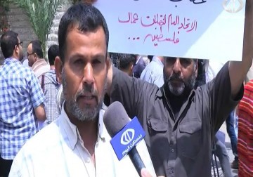 المئات من العمال يتظاهرون للمطالبة برفع الحصار الاسرائيلي عن القطاع - يوسف ابو كويك - 1 - 5 - 2016