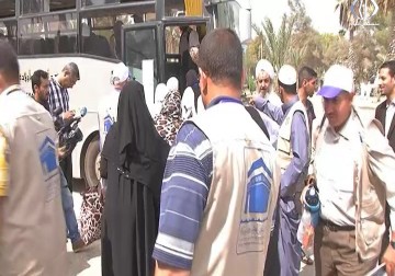 بعد فتح معبر رفح .. اولى قوافل الحجاج تغادر قطاع غزة لأداء فريضة الحج - رمزي البيروتي - 30 - 8 - 2016