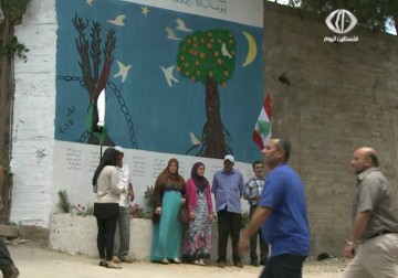 جمعية لنعمل من أجل المفقودين بالتعاون مع ابعاد  تطلقان جدارية المفقودين - 1 - 6 - 2015 - نورا المشهراوي