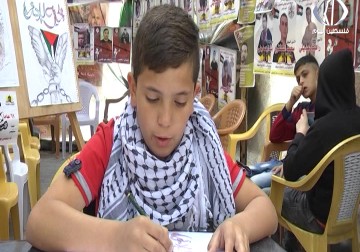 تقرير| حذيفة سامر يشارك بإسناد الأسرى برسوماته في خيمة الاعتصام بنابلس - جهاد بركات