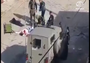 شهيدان بعد إعدامهما برصاص قوات الاحتلال في الخليل - 29 - 10 - 2015 - زينب السباعي ‏