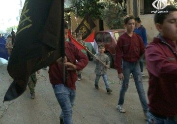 كشافة بيت المقدس تحي يوم الأرض بمسيرة في مخيم برج البراجنة  -  فاطمة ابراهيم  - 31 - 3 - 2016‏