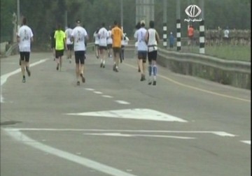 مسيرة احتجاج على إغلاق طريق رام الله نابلس بسبب ماراثون المستوطنين - 9 – 4 – 2015 – علي موسى