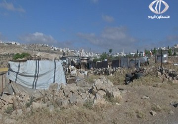  وقفة احتجاجية للبدو ضد مشروع إسرائيلي لتوسعة طريق سيؤدي لحصار تجمع بدوي شرق القدس - 11 - 5 - 2016