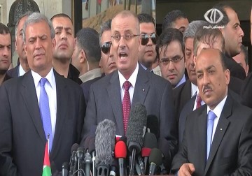 الحمدالله في غزة محملا بوعود لحل أزمات إعادة الإعمار والرواتب ودفع المصالحة – 25 – 3 – 2015 - يوسف ابو كويك