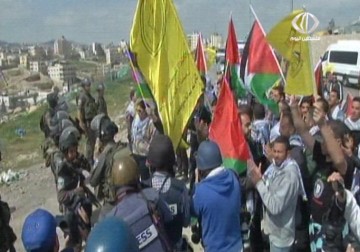 الاحتلال يعتقل 5 مشاركين في مسيرة بوابة القدس ويفرقها بقنابل الغاز والرصاص – 18 – 3 – 2015 – علي موسى