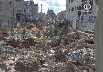 أصحاب البيوت المهدمة في قطاع غزة يشتكون نقص عدالة توزيع التعويضات  - 24 – 2 – 2015 - رمزي أبو جزر