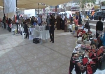 جمعية المرأة العاملة الفلسطينية تنظم معرضا بعنوان أيار ومنتوج الديار في البيرة - 10 - 5 - 2015 - علي سليمان