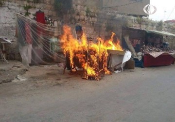 مواطن يلقي بنفسه من الطابق الرابع بعد إزالة بسطته في نابلس - 17 - 5 - 2015 - فاتن الصالح