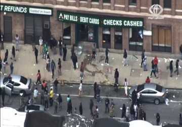 اضطرابات عنيفة في بالتيمور الامريكية احتجاجا على مقتل مواطن من أصول إفريقية أثناء اعتقاله – 28 – 4 – 2015 – أماني عثمان