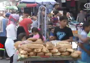 تقرير| قبيل عيد الفطر...حركة شرائية ضعيفة في أسواق القطاع