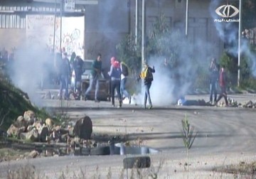 مواجهات قرب معتقل عوفر بذكرى انطلاقة الجبهة الشعبية    - 13 – 12 – 2014 – جهاد بركات