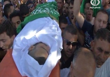 تشييع جثمان الشهيد أنس طه في مسقط رأسه قطنة - 10 - 8 - 2015 - أماني عثمان