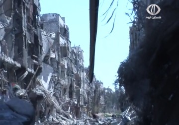 اشتباكات عنيفة بين تنظيم داعش ومسلحي أكناف بيت المقدس داخل مخيم اليرموك - 5 - 4 - 2015 - رنا بجيرمي