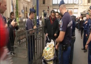 ألمانيا تعلن برنامجا فيدراليا بقيمة 6 مليارات يورو لمواجهة أزمة اللاجئين – 08 – 09 - 2015