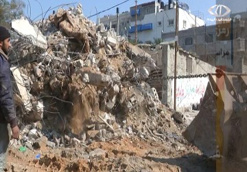 بدء إزالة الركام بعد أكثر من 4 شهور على توقف العدوان على قطاع غزة – 19 – 1 – 2015 - رمزي البيروتي