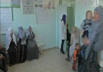 لجان مخيمات الضفة تحذر من القبول بالبطاقة النقدية الإلكترونية - اماني الحسين - 27 - 5 - 2016