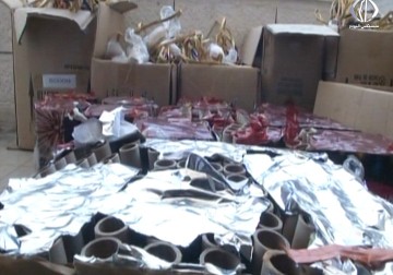 حريق أمام محلات تجارية في قلنديا ناجم عن إطلاق المفرقعات - فاتن الصالح - 8 - 6 - 2016