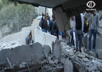 الاحتلال يفجر منزلي الشهيدين محمد جعابيص وغسان أبو جمل في جبل المكبر - 6 - 10 - 2015 - زينب هاشم